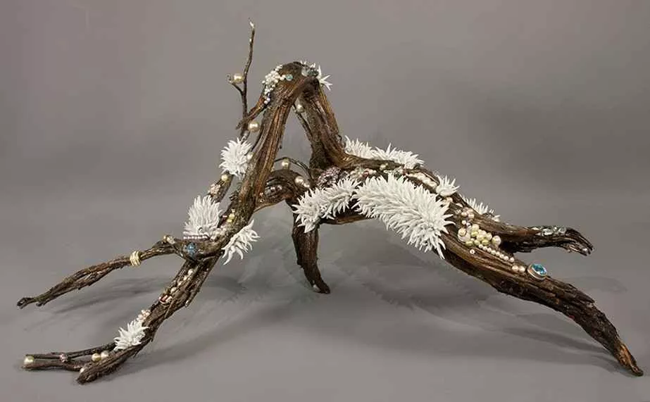 LIfe Laughs, 13” x 31” x 13”, resin, found objects, beads by Tania Dibbs