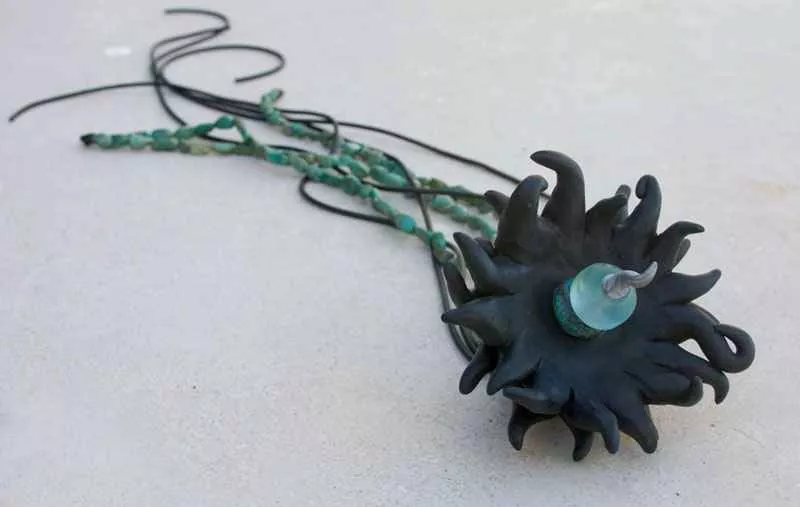 Moon Flower, 5″ x 29″, sculpture by Tania Dibbs