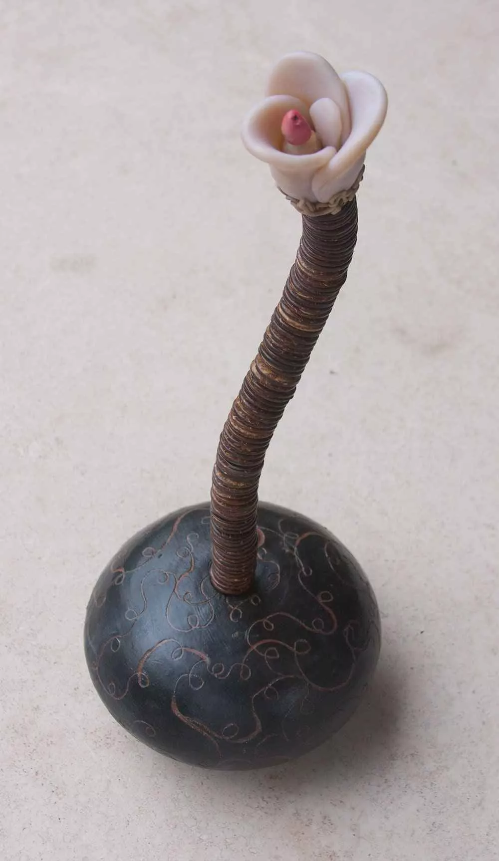 Proboscis 2, 6″ sphere, 18″ long, mixed media by Tania Dibbs