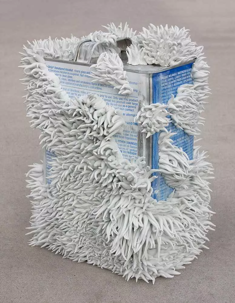 Reclamation, 11” x 6” x 8”, resin and can by Tania Dibbs