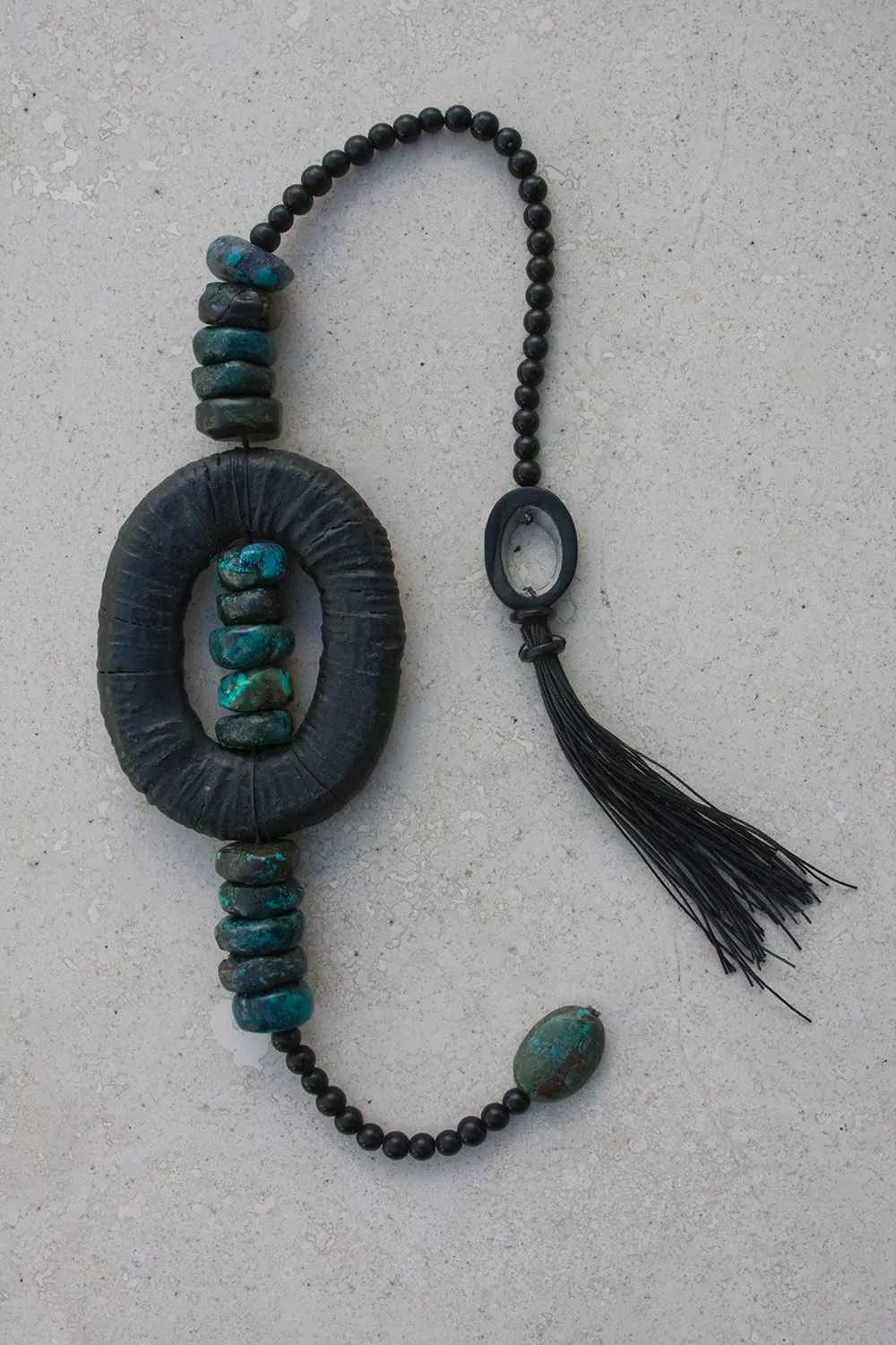 Turquoise Ring, 26″, 3.5″ x 4.5″ ring, mixed media by Tania Dibbs